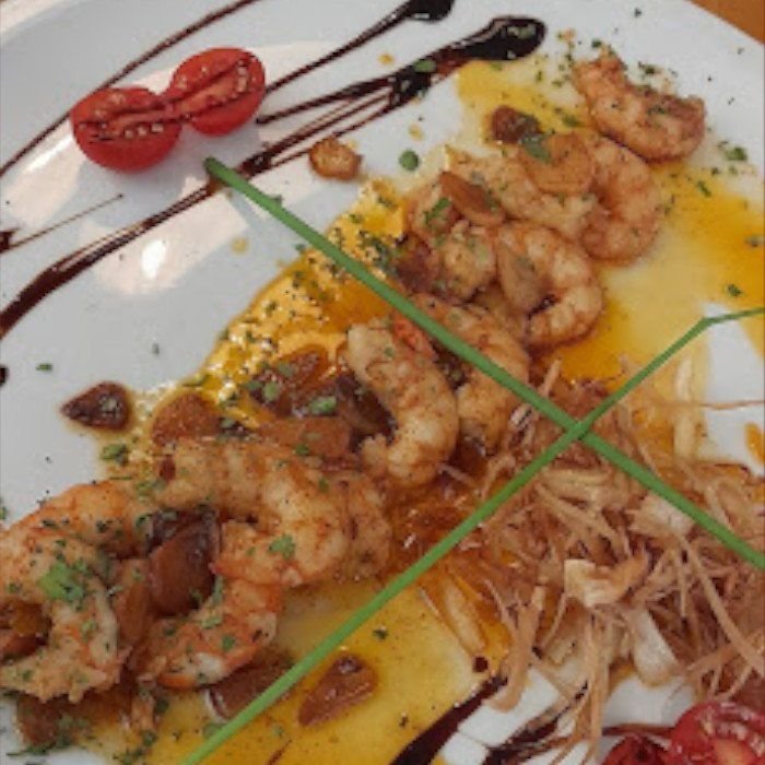 Gambes de Palamós marinades amb fines herbes